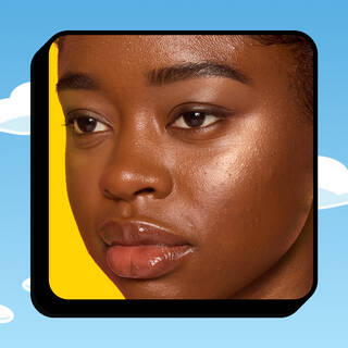 Model holding The Simpsons Makeup Sponge