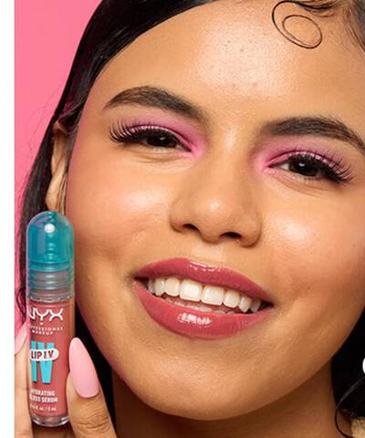 Lightweight NYX Lip IV Hydrating Gloss Stain on medium warm skin tone