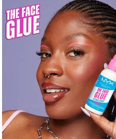 Model showcasing the NYX Face Glue vegan setting spray.